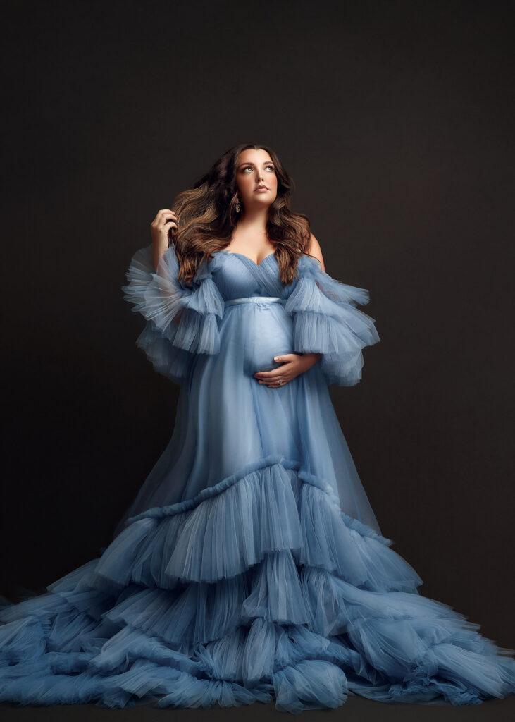 maternity photo session mom dress in the finest couture blue gown