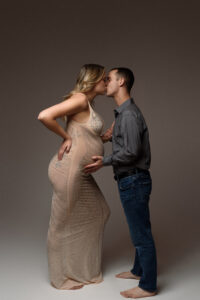 Kissing Syracuse, New York Photographer. Maternity for Syracuse, New York Photography